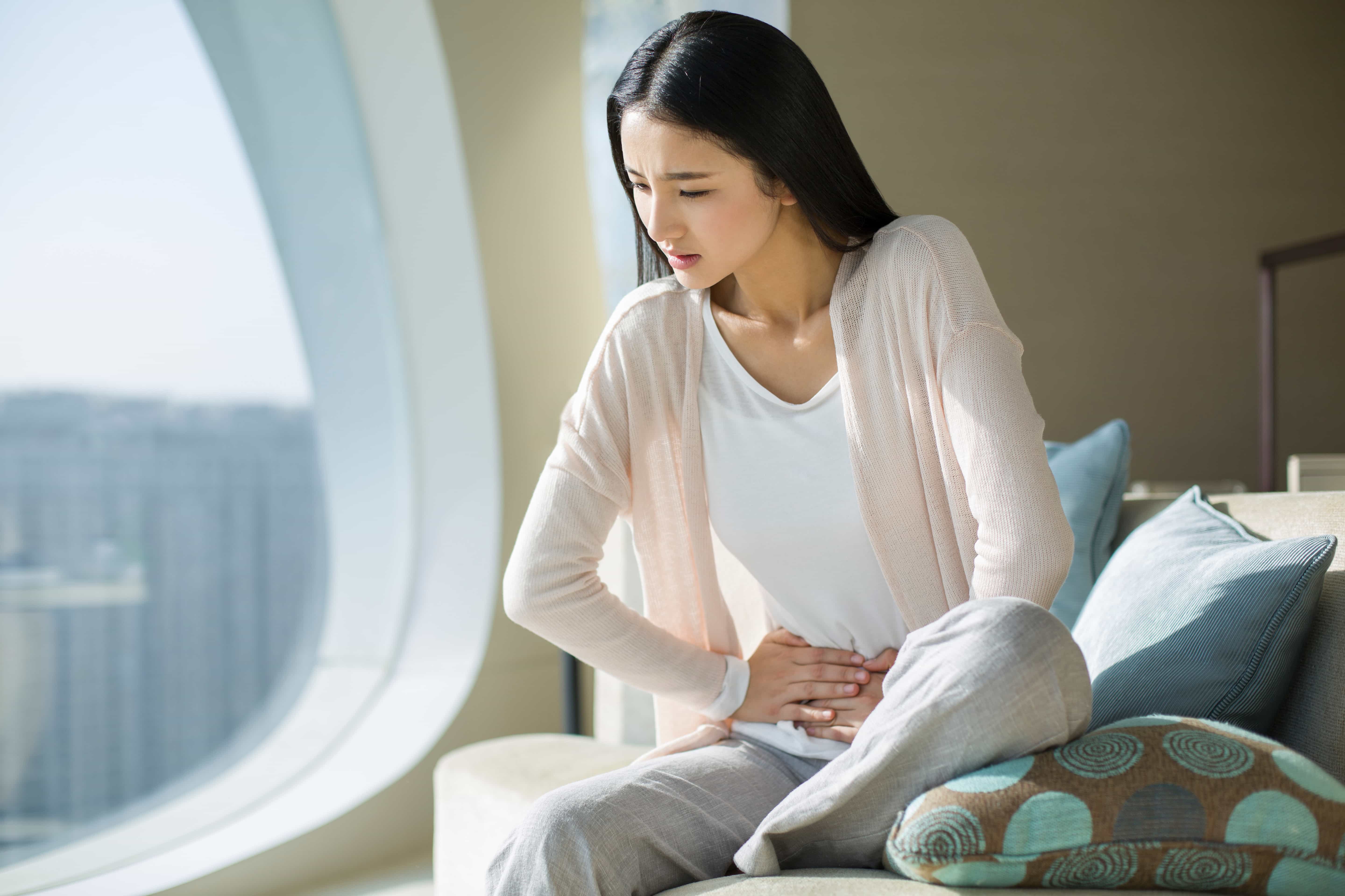 Traveler dealing with sudden temperature changes and feeling unwell